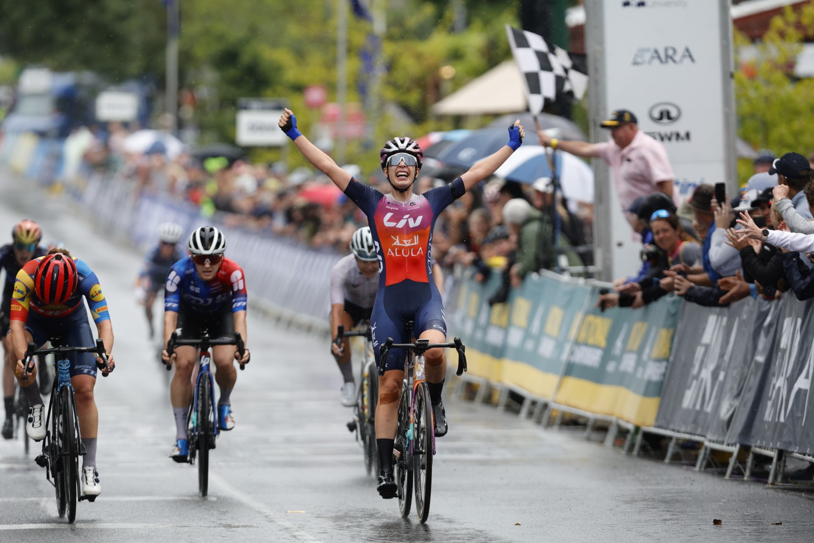 Ruby Roseman-Gannon celebrates winning the elite women's road race at the 2024 AusCycling Road Race National Championships in Buninyong, Ballarat